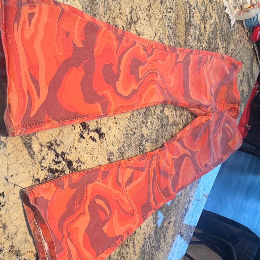 Free People / We The Free Coral and Orange Tie-Dye Penny Pull on Flare jeans